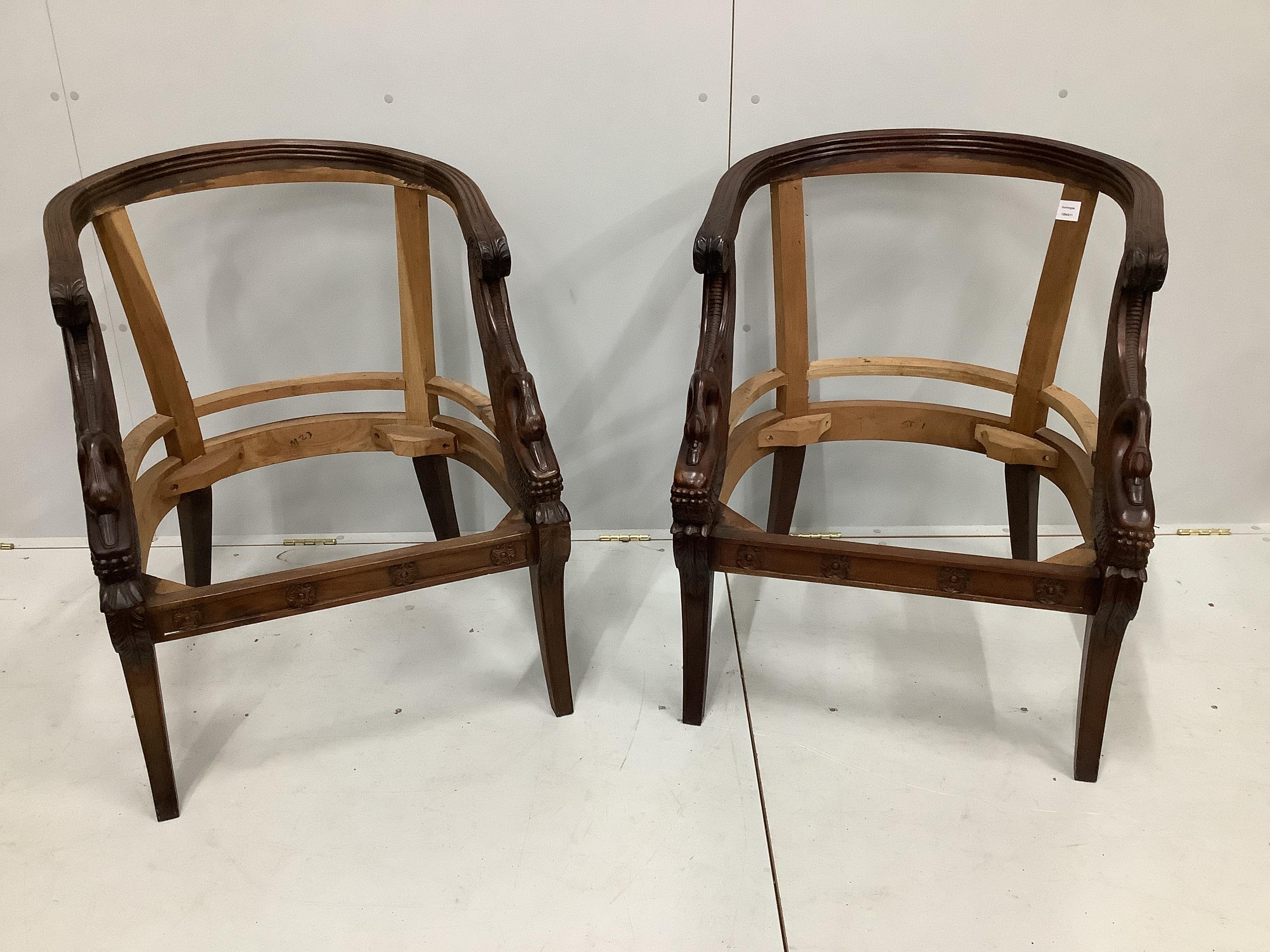 A pair of Empire style mahogany Bergere chair frames, width 67cm, depth 60cm, height 84cm